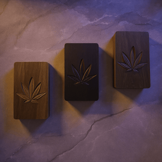 Cannabis Leaf Wooden Tobacco Box – Hand - Carved Herb Stash CaseFlatlay of three engraved wood boxes in different tones