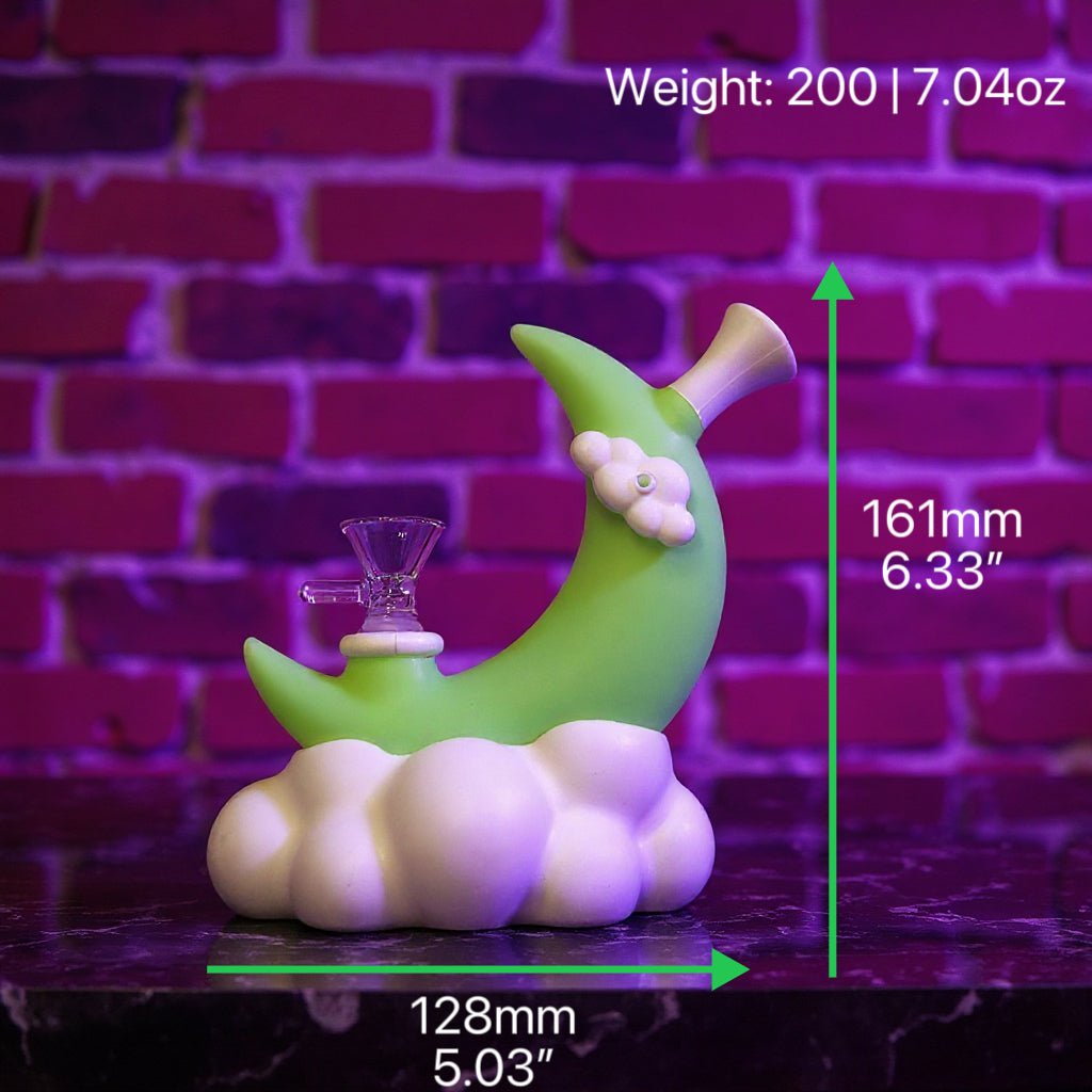 ☁️ CloudBreaker Water Pipe - Dreamy Silicone BongGreen and white moon - shaped silicone bong with measurements against a brick wall background