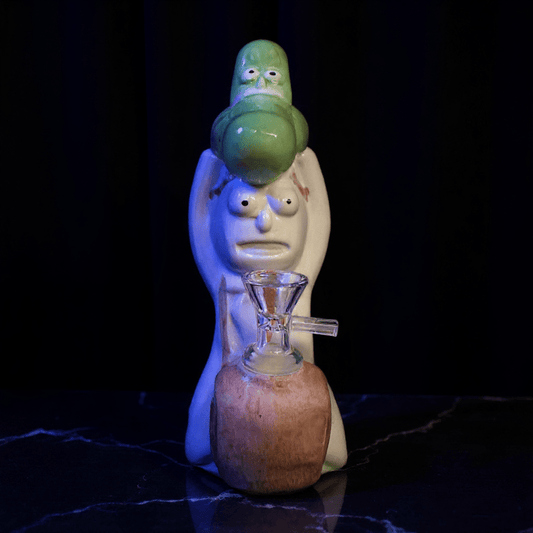 Cosmic Sidekick Ceramic Water PipeClose - up of a novelty pickle water pipe with glass bowl.