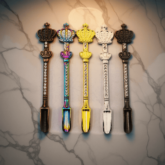 Crown Snuff Spoon with Rhinestones – Five decorative spoons with crowns on a marble background