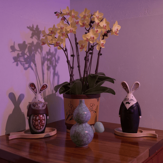 Ice - Crack Blue Celadon Gourd Porcelain BongIce - Crack Blue Celadon Gourd Porcelain Bong with glass bowl is placed on a wooden surface.
