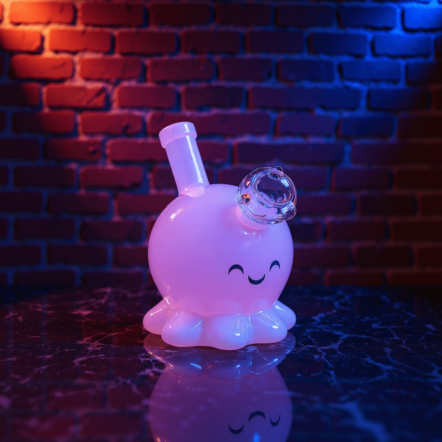 🐙 Octopus Bong - mini octopus glass bong for girlGlowing octopus glass bong with a smiley face design on a reflective surface