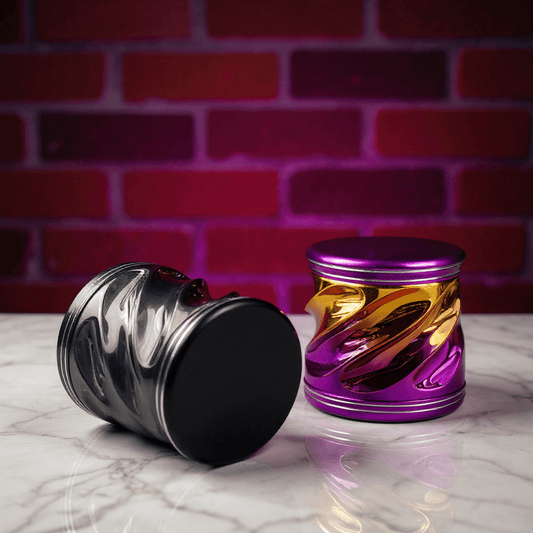 Spiral Grip Aluminum Herb Grinder - Two metallic herb grinders, one silver and one purple with black accents