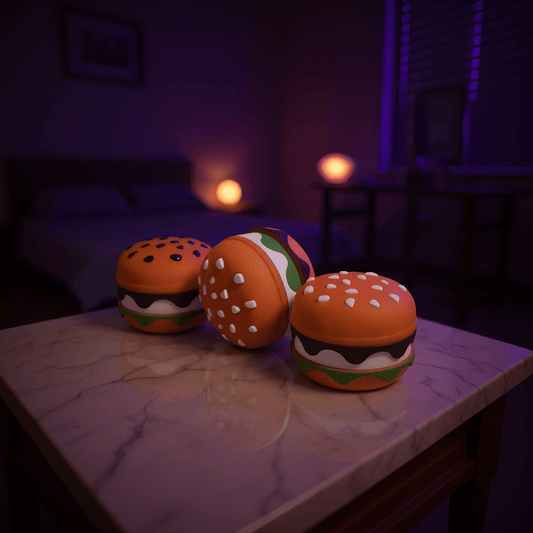 Stacked Burger Herb Grinder - Three burger herb grinders with different sesame seed styles