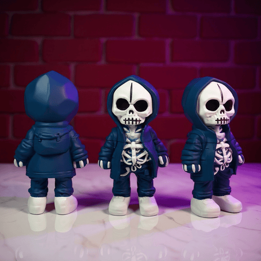 Streetwear Hoodie Skeleton Grinder – Urban Skull CrusherThree skeleton grinder in blue outfits with hoodies against a red brick wall.