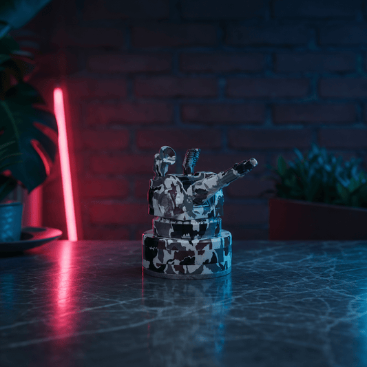 Tactical Operator Cannon Grinder & Pipe ComboDecorative grinder on a table with a brick wall and neon light in the background