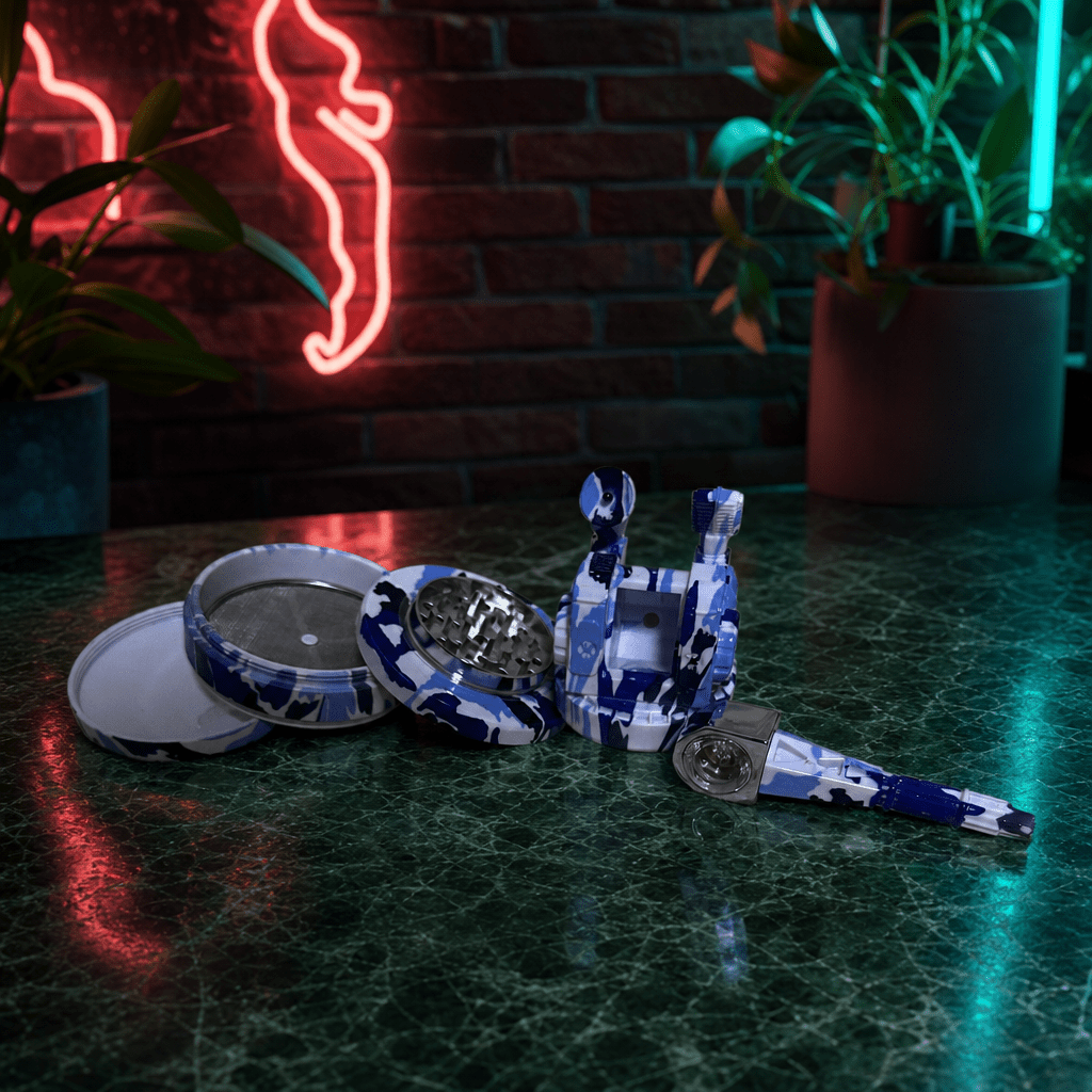 Tactical Operator Cannon Grinder & Pipe ComboCamouflage - patterned grinder and accessories on a dark surface with neon lights in the background