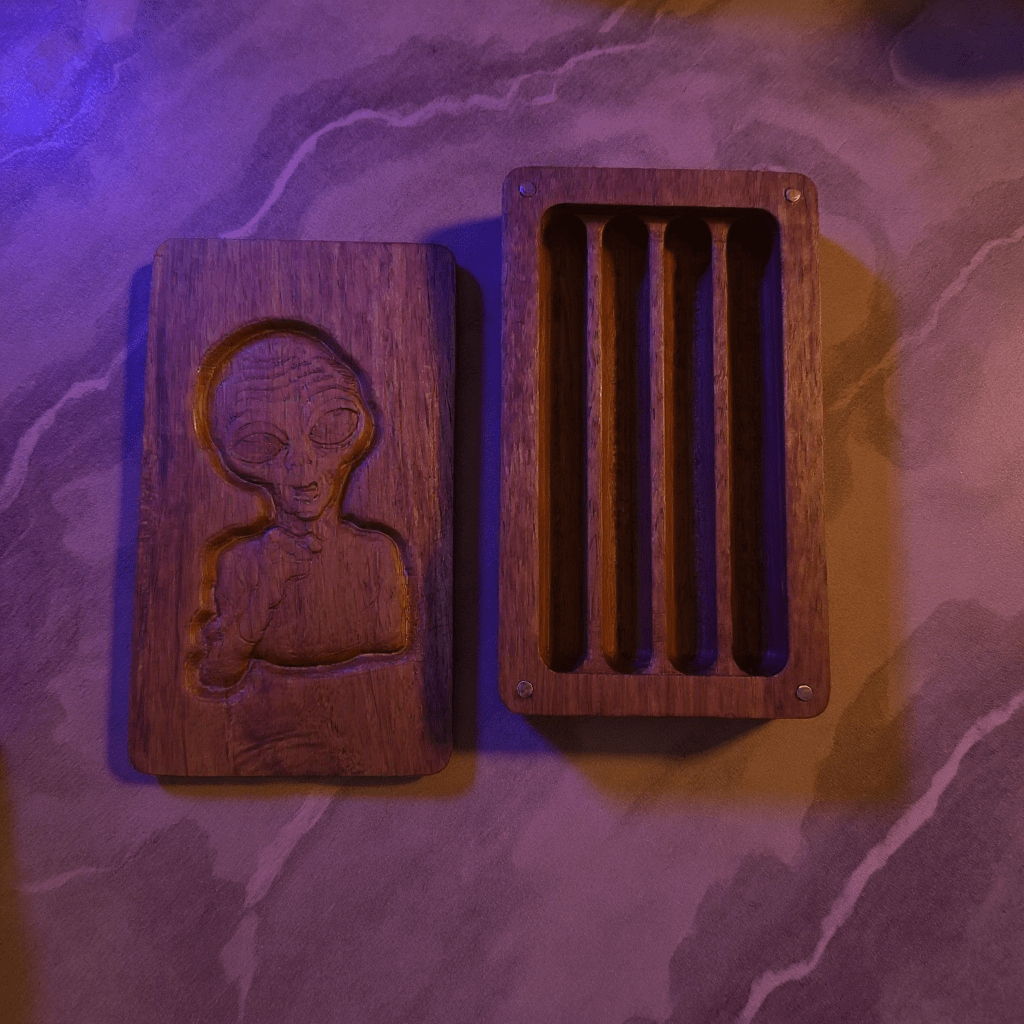 Alien Wooden Tobacco Box – Hand Carved Herb KeeperOpen alien wood stash box showing inside joint slots and magnetic closure