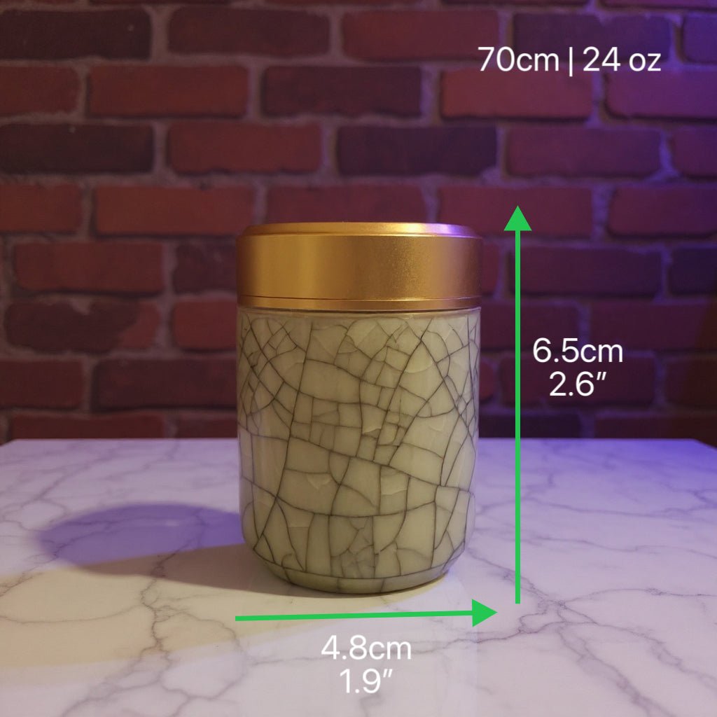 Ceramic stash jar with gold lid and crackle glaze design, shown with measurements 