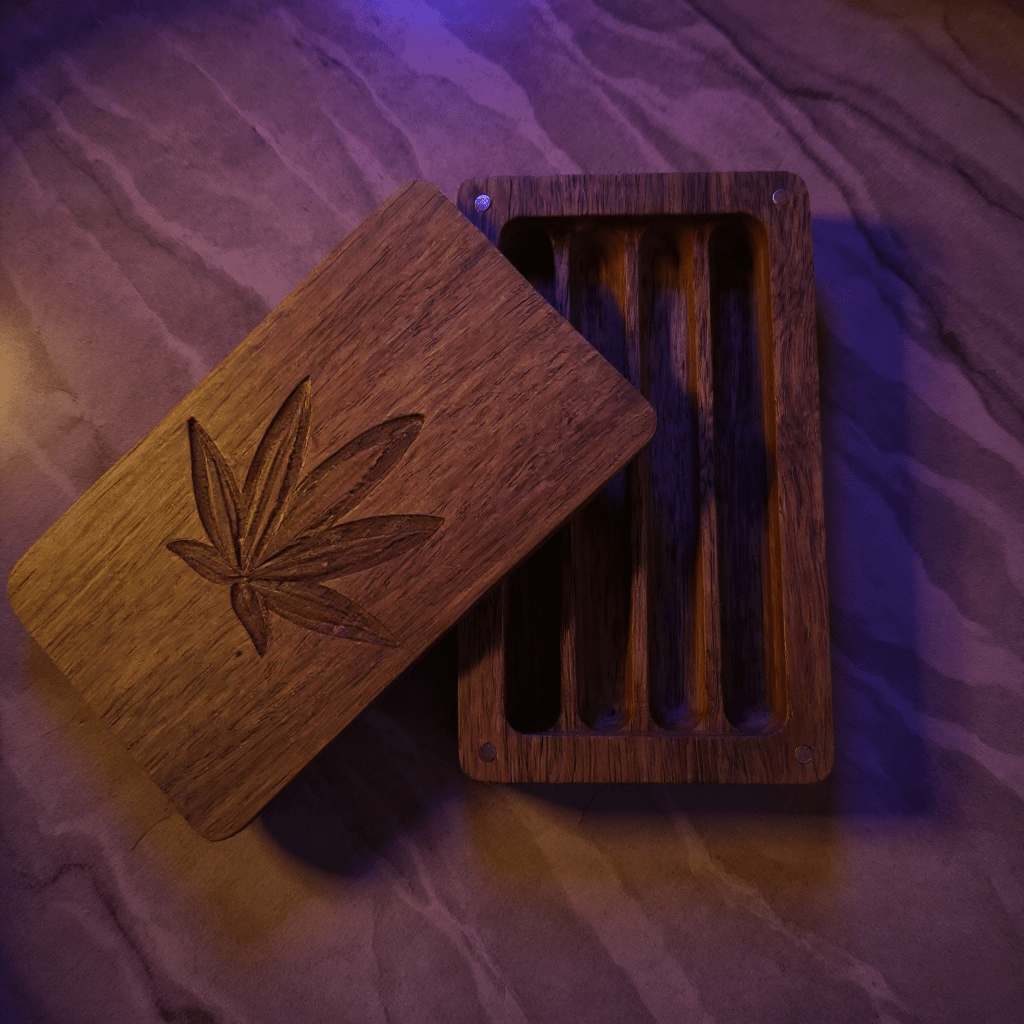 Cannabis Leaf Wooden Tobacco Box – Hand - Carved Herb Stash CaseOpen wooden stash box with carved cannabis leaf lid and four
