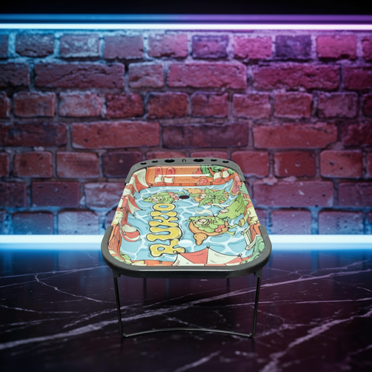 Chill Pool Party Elevated Rolling Tray Station – Trippy Cartoon Prep TableColorful rolling tray with cartoon design on a dark surface against a brick wall.