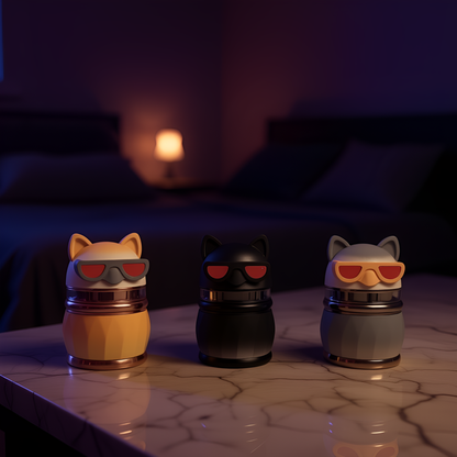 Layer Herb & Spice CrusherSet of 3 cat - shaped herb grinders in yellow, black, and gray with sunglasses