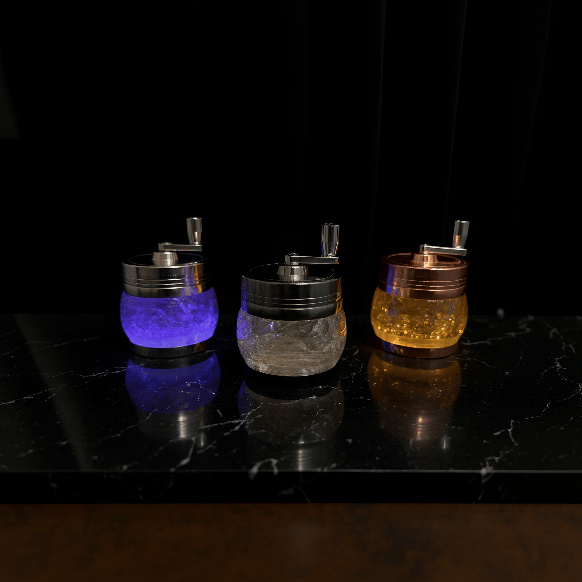 Crystal Hand Crank Herb Grinder -Romantic purple - lit room featuring a trio of designer hand - crank grinders.