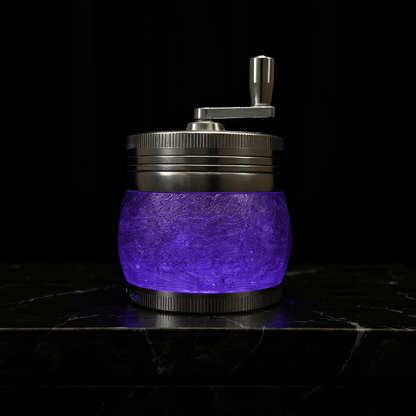 Crystal Hand Crank Herb Grinder - themed photo of a deep purple grinder with a smooth metallic finish.