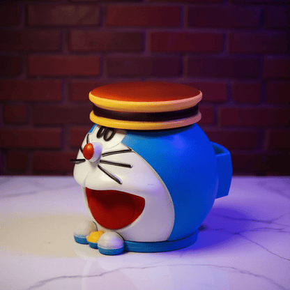 Cute Cat Crank Grinderside view of a blue Doraemon weed grinder with visible storage cap and wide smile