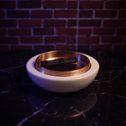 Cute Ceramic Cat Herb Grinder – Spice CrusherWhite and gold bowl of bottom of cute cate grinder on a dark surface