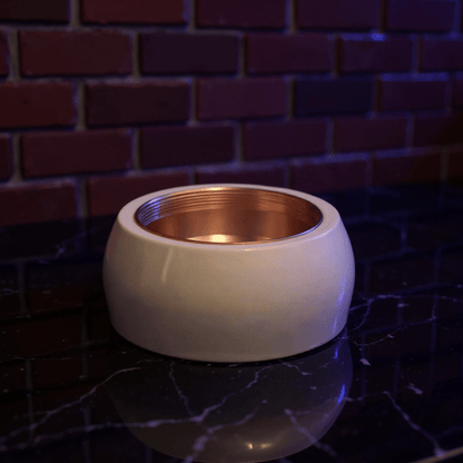 Cute Ceramic Dog Herb Grinder - Bottom view of ceramic - style dog grinder chamber in glossy white and copper.