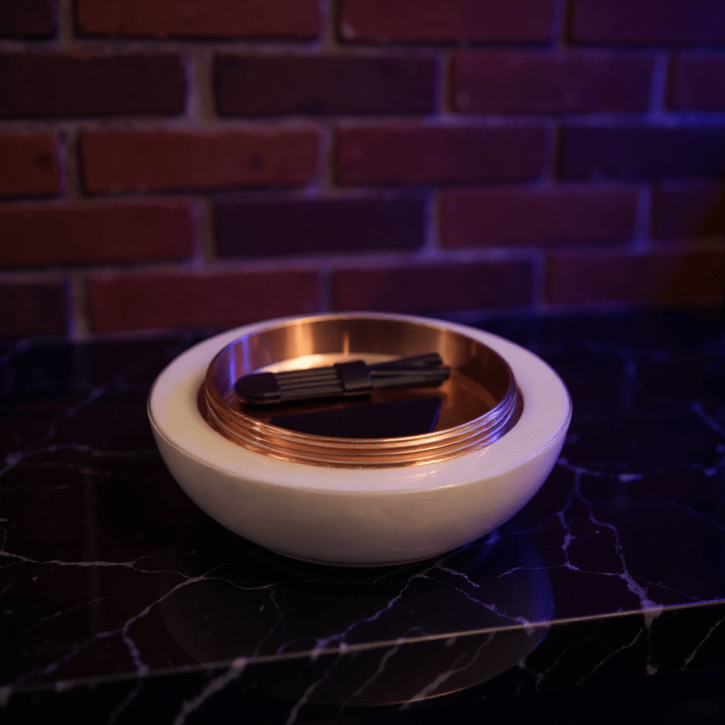 Cute Pig Ceramic Herb Grinder – Spice Crusher - White bowl with a metallic interior as a pig grinder bottom on a dark surface