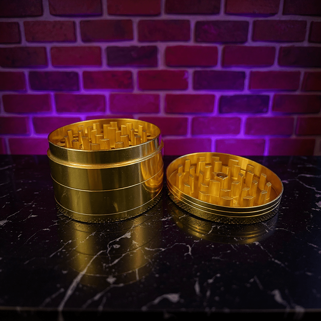 Doge Meme Herb Grinder - Gold metal grinder on a dark surface with a brick wall background