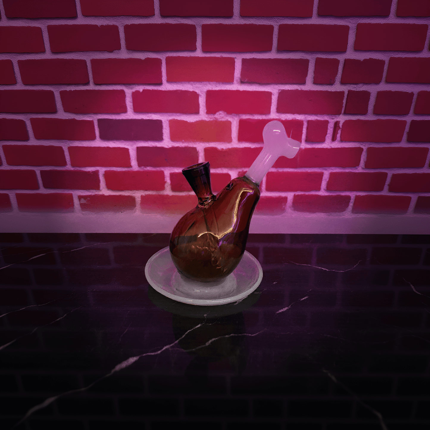 Drumstick Glass Bong – Mini Turkey Leg Water Pipe - Decorative drumstick glass bong with a stopper on a white plate