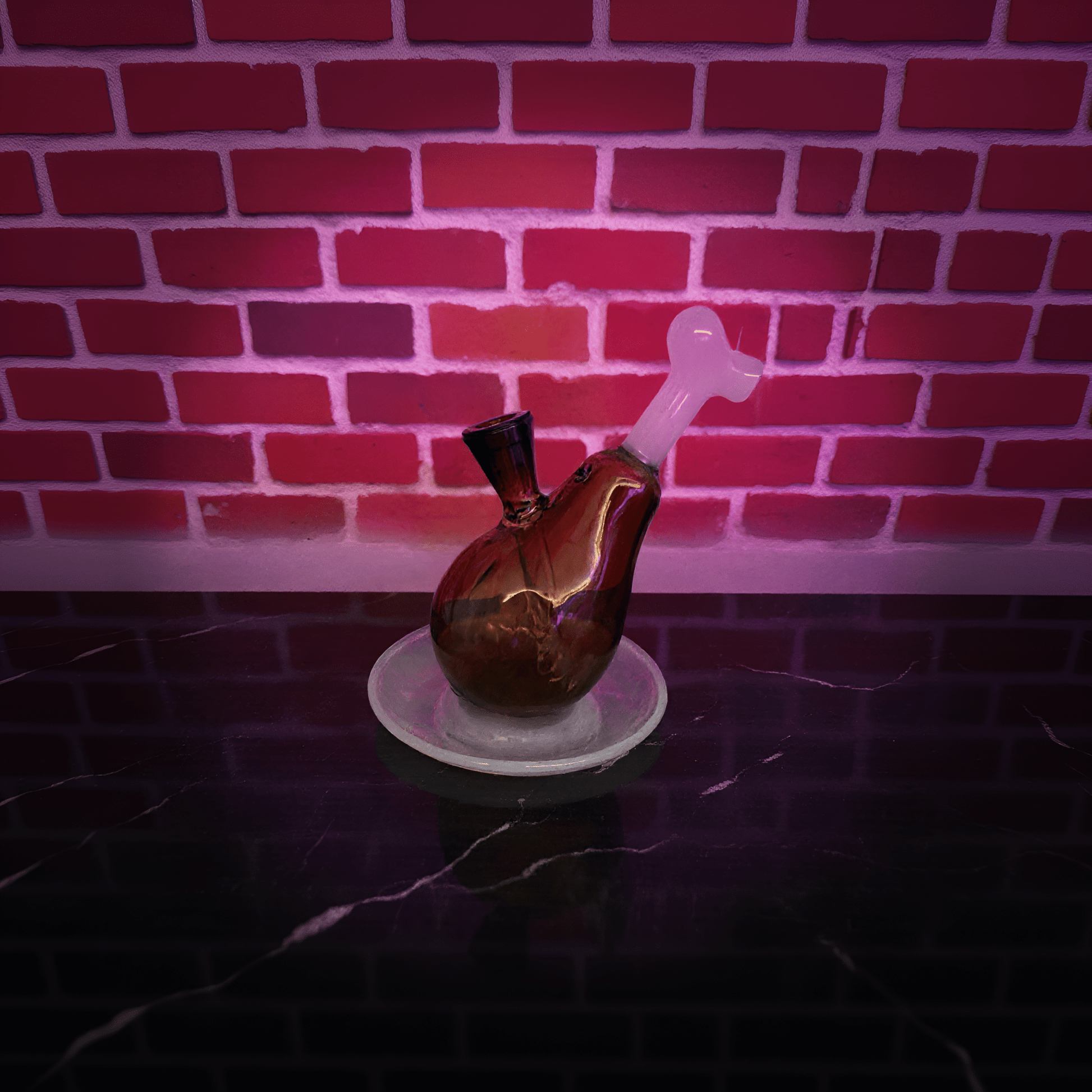 Drumstick Glass Bong – Mini Turkey Leg Water Pipe - Decorative drumstick glass bong with a stopper on a white plate