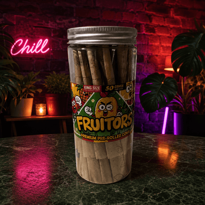 FruitBurst King Size Fruit Flavored Pre - Rolled Cones – 50 PackTub of Fruitors pre - rolled cones on a dark surface with a neon 'Chill' sign in the background.