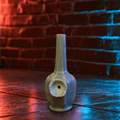 Green Dragon Scale Celadon Flat-Sided Porcelain BongIce - Crack Green Celadon Flat - Sided Porcelain Bong with ceramic bowl is placed on a wooden surface