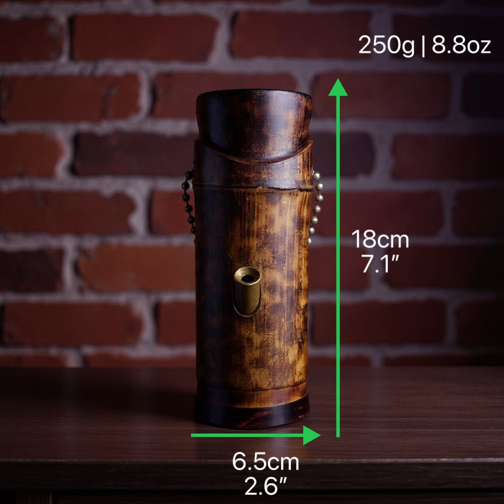 Handcrafted Bamboo Bong – Eco - Friendly Water Pipe with Natural AromaBamboo bong with measurements against a brick wall background
