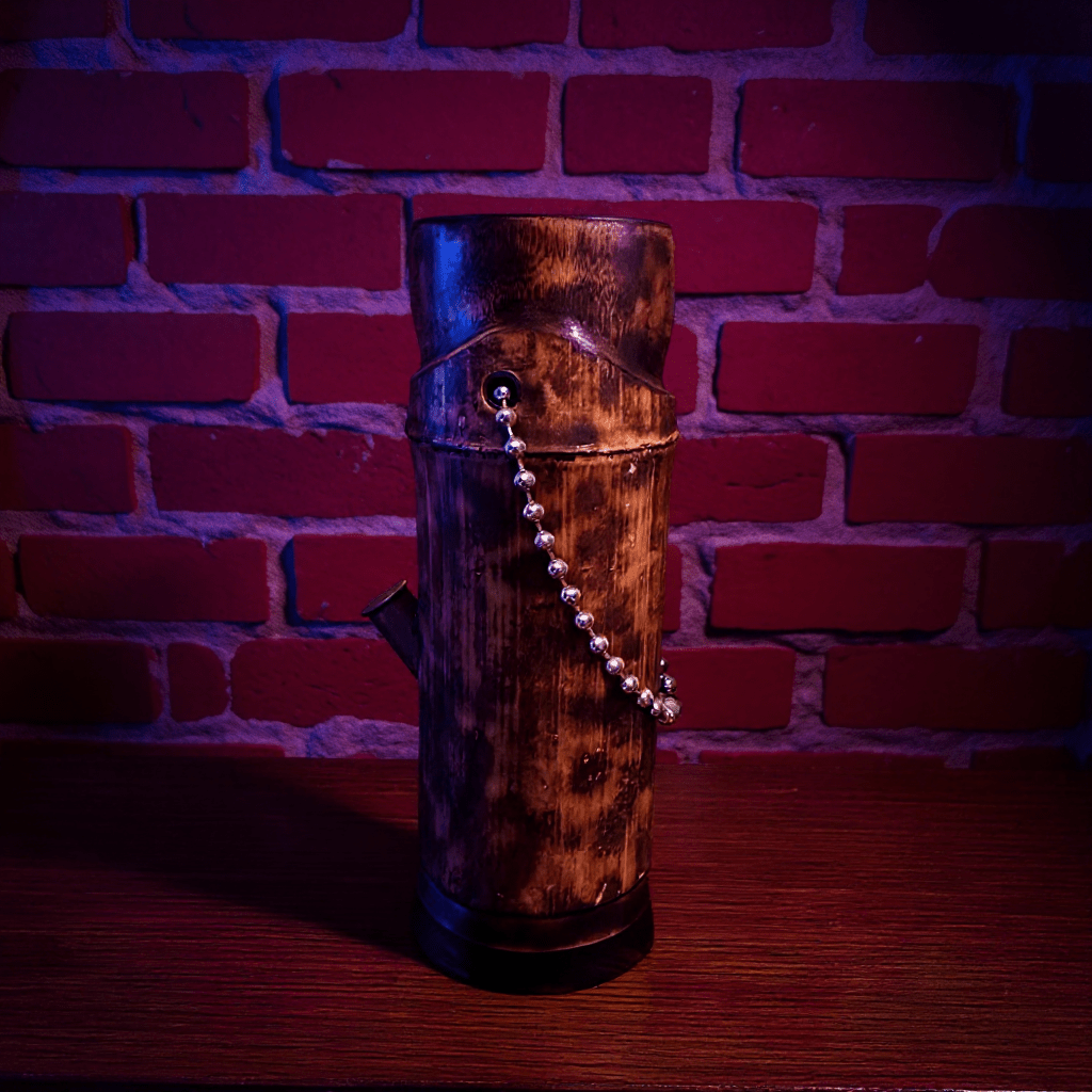 Handcrafted Bamboo Bong – Eco - Friendly Water Pipe with Natural AromaDecorative bamboo bong with a textured surface