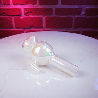 Hello Glow Mini Bong – Cute Style with Crystal Glass. Glass pipe with rainbow iridescent finish on a white surface