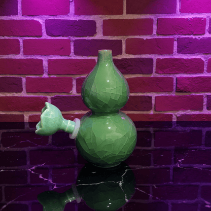 Ice - Crack Green Celadon Gourd Porcelain BongIce - Crack Green Celadon Gourd Porcelain Bong with ceramic bowl is placed on a marble surface.