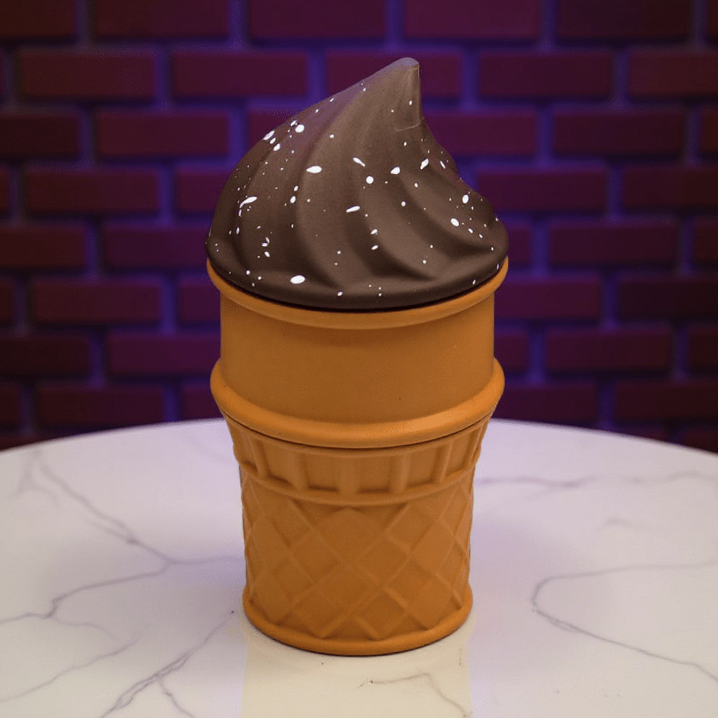 Ice Cream Herb Grinder – Cute 3 - Piece Swirl Cone Set- Chocolate ice cream herb grinder against a brick wall background