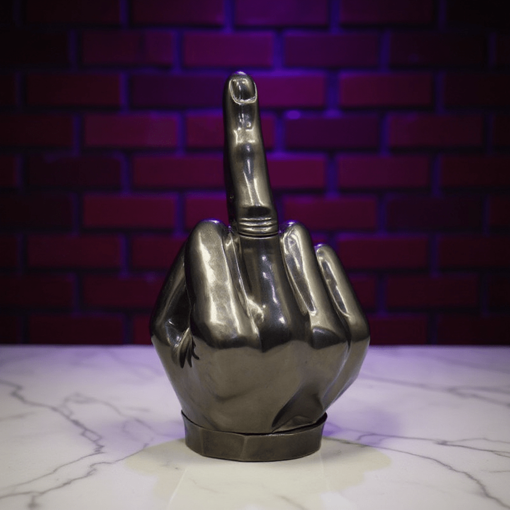 Middle Finger Grinder & Pipe Combo – Heavy Duty 2 - in - 1 SystemMetallic hand grinder with a middle finger gesture against a brick wall background