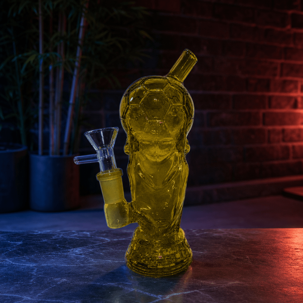 Mini 2026 American World Cup Trophy Glass Bong – Soccer & Footballworld cup glass smoking device on a dark surface with a brick wall background