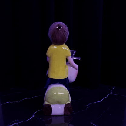 Morty Stack Ceramic Bong – Rear view of Rick and Morty cartoon bong in use with visible smoke in bedroom setting.