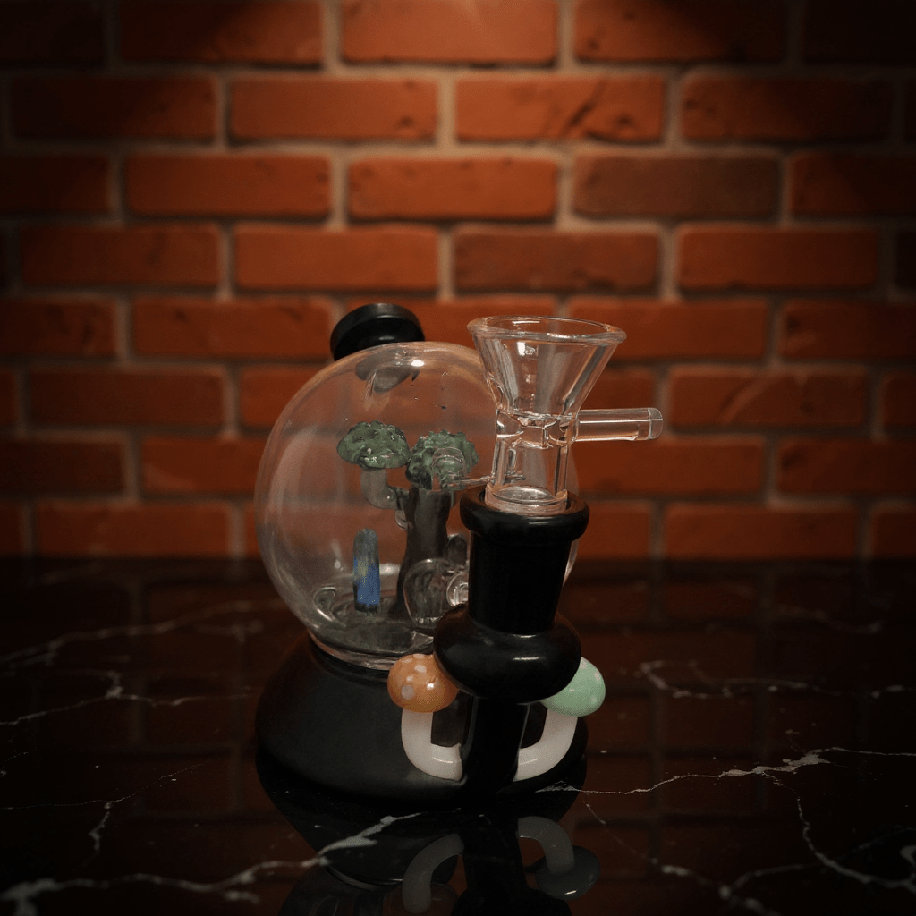 Mushroom Globe Bong - Glass smoking bong with tree decoration against a brick wall