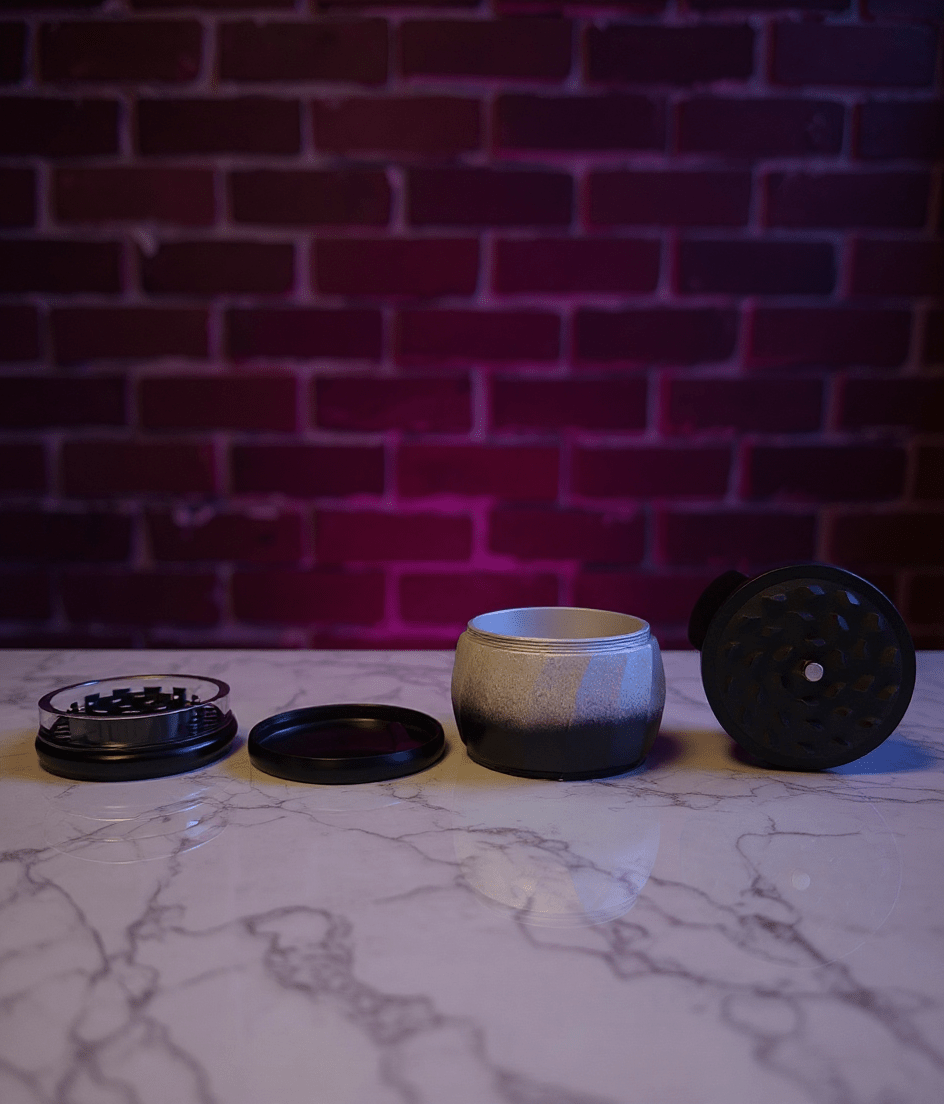 Panda Pop Herb Grinder – Cute, High Quality 4 - Piece Crusher4 - Layer Herb & Spice CrusherPanda herb grinder fully disassembled showing 4 - layer magnetic build and sharp teeth