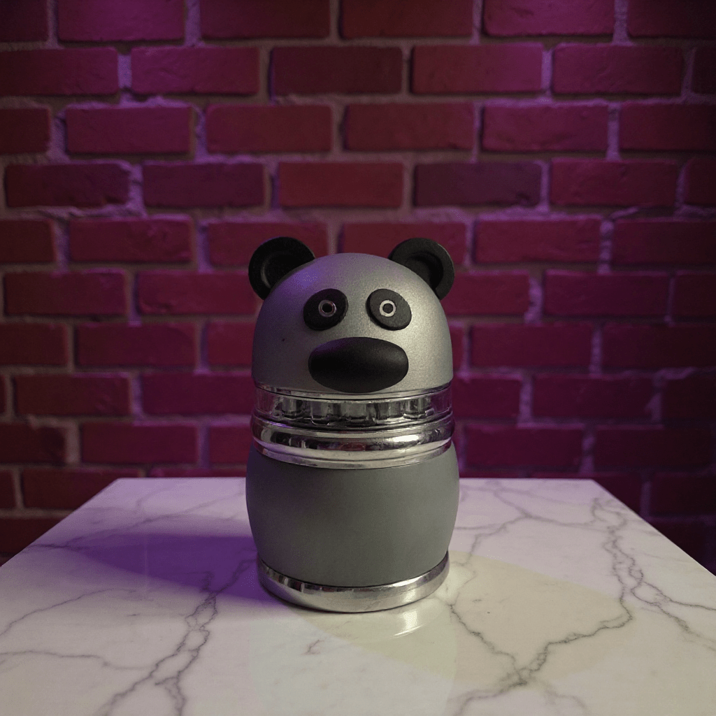 Panda Pop Herb Grinder – Cute, High Quality 4 - Piece CrusherPanda Pop Grinder – 4 - Layer Herb & Spice CrusherStainless panda grinder with clear magnetic lid and large eyes