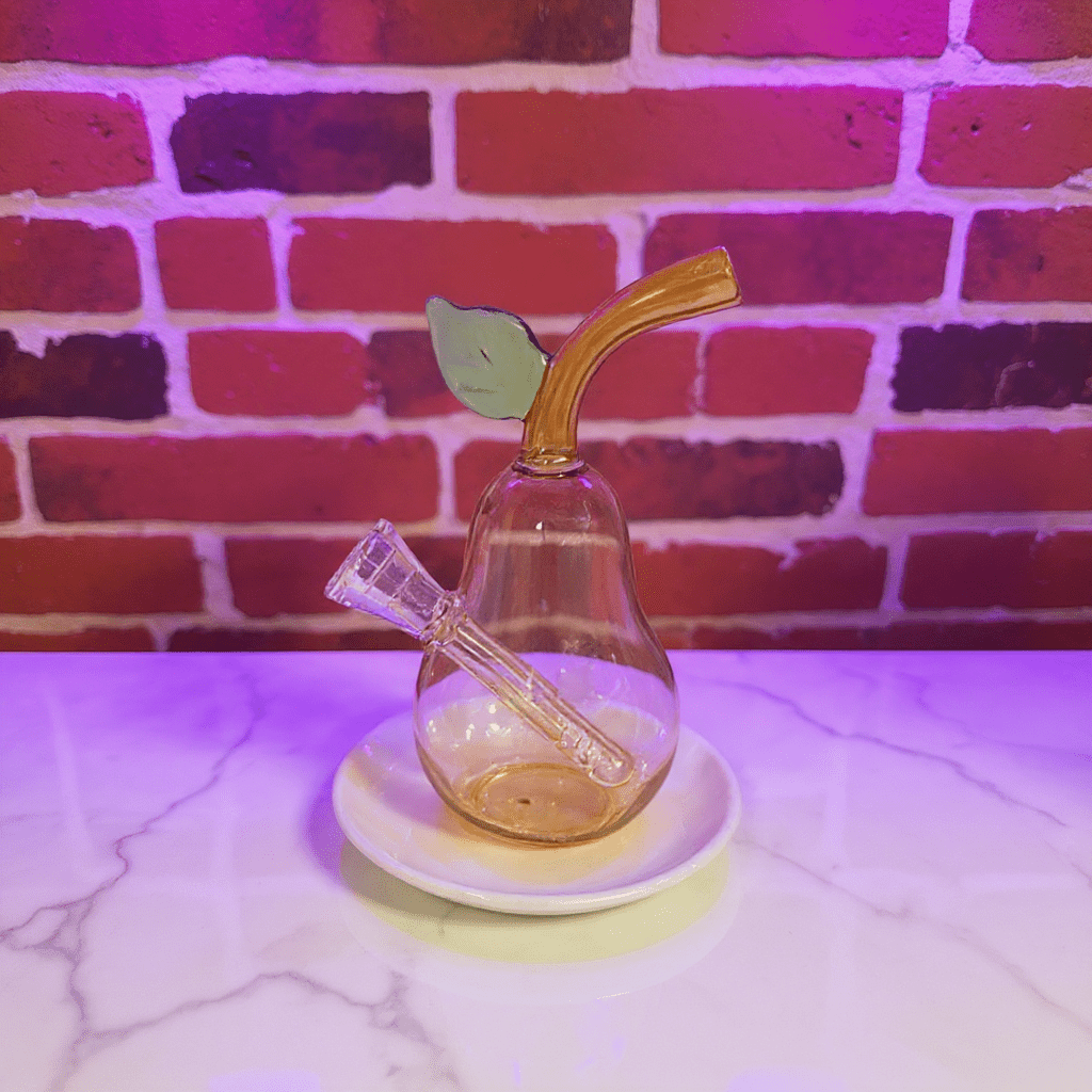 Pear Glass Bong – Mini Fruit Water Pipe with Bowl - Glass smoking pipe with pear shape and leaf accent on a white surface