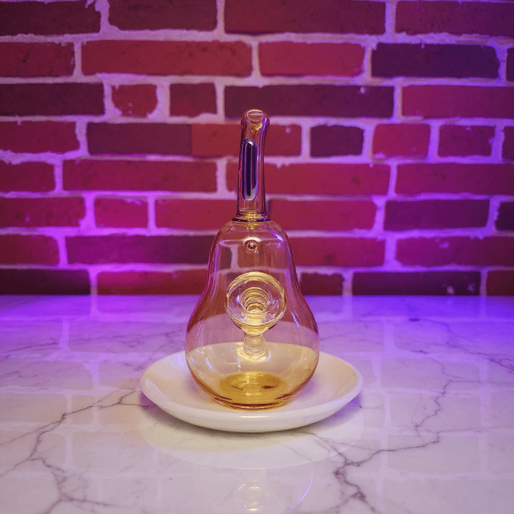 Pear Glass Bong – Mini Fruit Water Pipe with Bowl - Glass water pipe - shaped light fixture on a white plate