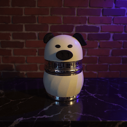 Piggy Puff Grinder – 4 - Layer Herb & Spice CrusherPiggy Puff Grinder – 4 - Layer Herb & Spice CrusherAdorable pig herb grinder with black nose detail on wooden table