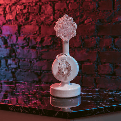 Plumbus-Inspired Sculptural BongA playful Plumbus-inspired bong with a surreal pink and cream sculptural design. A unique sci-fi water pipe made to stand out in any collection.