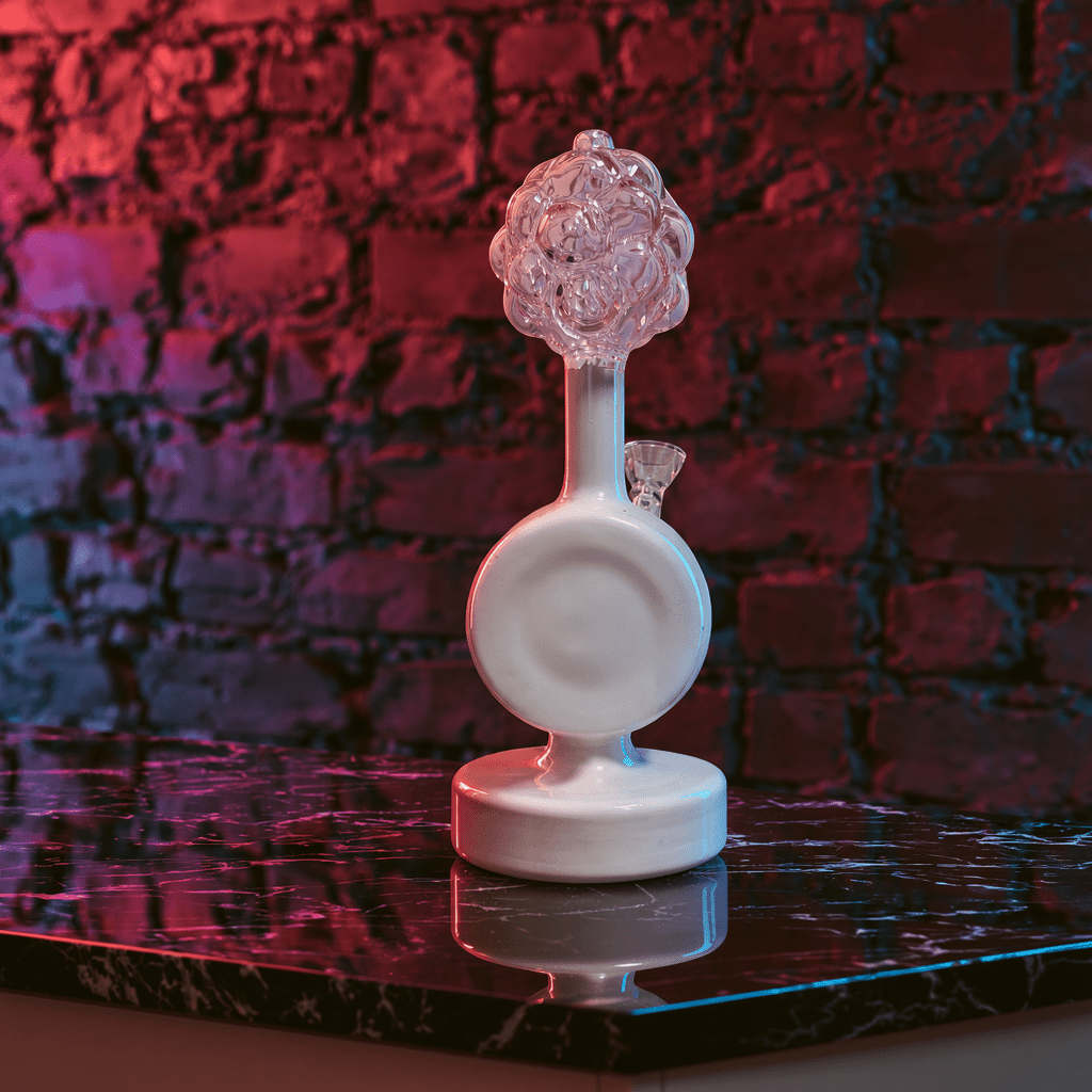 Plumbus-Inspired Sculptural BongA playful Plumbus-inspired bong with a surreal pink and cream sculptural design. A unique sci-fi water pipe made to stand out in any collection.
