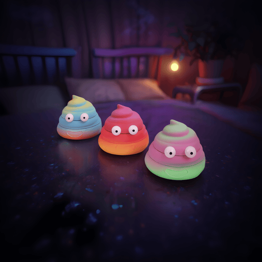 poop emoji shaped grinderClose - up of poop grinders in rainbow colors with giant silly faces, looking unapologetically cheeky.