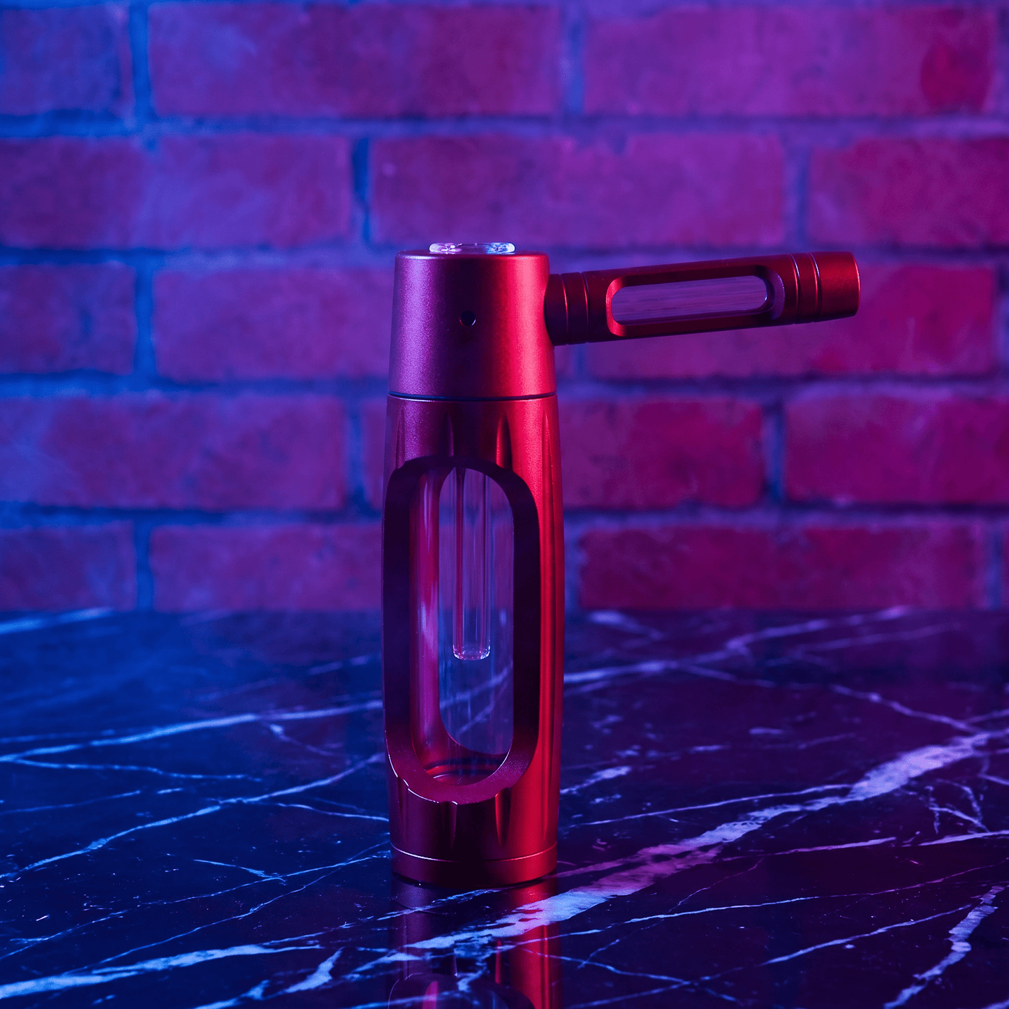 Heavy Duty Spill - Proof Water PipeRed handheld smoking pipe on a reflective surface with a brick wall background