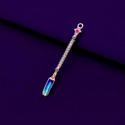 Rainbow Titanium Snuff Spoon – Mini Herb Scoop with LoopDecorative spoon charm with gemstones on a purple background