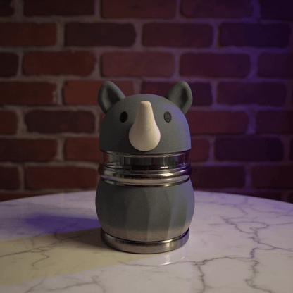 Rhino Buddy Herb Grinder – 4 - Layer Cute Spice & Herb Crusher4 - Layer Cute Spice & Herb CrusherMatte dark gray rhino - shaped herb grinder with upright ears and centered horn