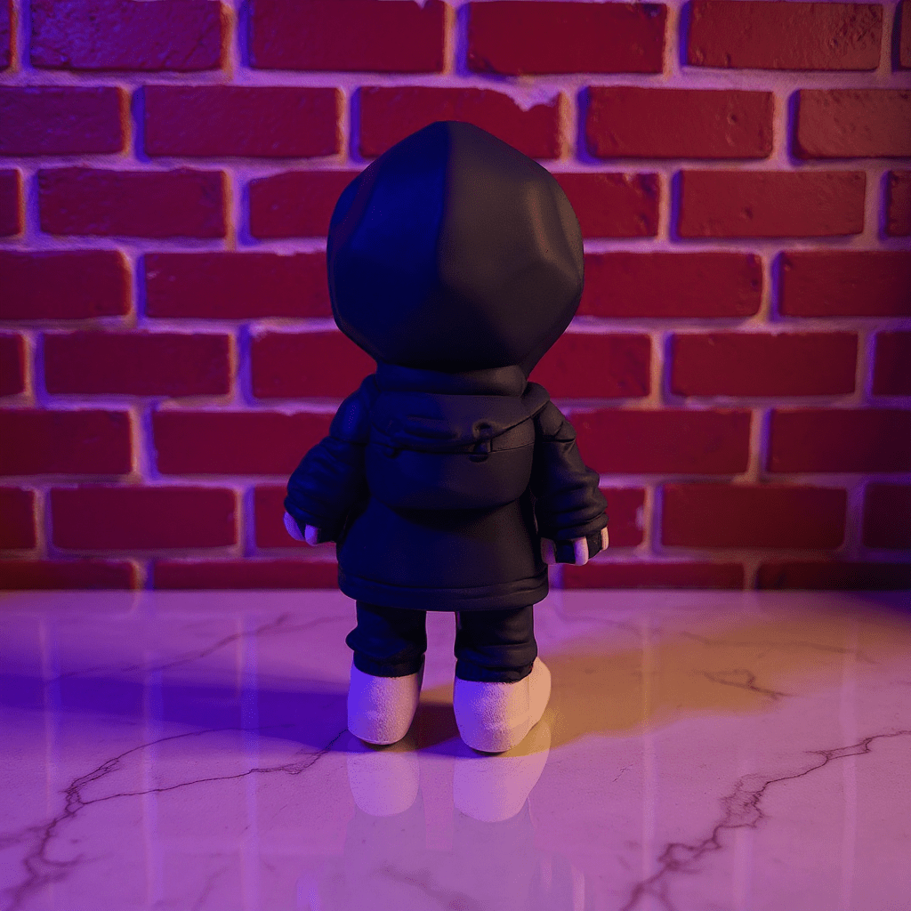 Streetwear Hoodie Skeleton Grinder – Urban Skull Crushernavy hooded figure standing against a brick wall with a purple hue