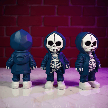 Streetwear Hoodie Skeleton Grinder – Urban Skull CrusherThree skeleton grinder in blue outfits with hoodies against a red brick wall.