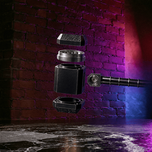 Thor Hammer Shape Grinder – 4-Part Metal GrinderA black metal cylindrical container or grinder shown disassembled into floating components, with a matching black handle extending from the right. The background is a stylized brick wall lit with purple and blue neon lighting.